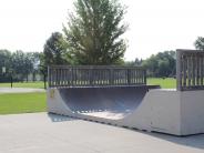 Picture of skate ramp and basketball court