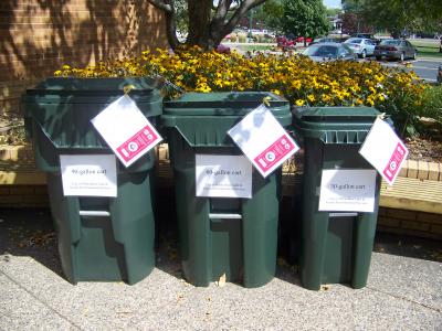 Picture of different sized trash cans